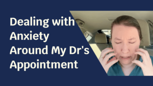 Blue solid foreground with text "Dealing with Anxiety Around My Dr's Appointment" and to the side a picture of a pale skinned woman in a car, looking stressed.