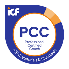 Round circle badge logo with blue rim and a thin orange inner rim. Blue letters state: "PCC Professional Certified Coach. ICF Credentials & Standards."