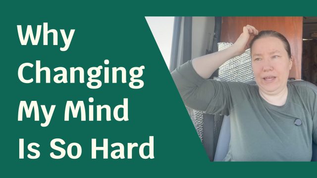 A woman scratching her head, surrounded by a green foreground. Text next to her reads: "Why Changing My Mind Is So Hard".